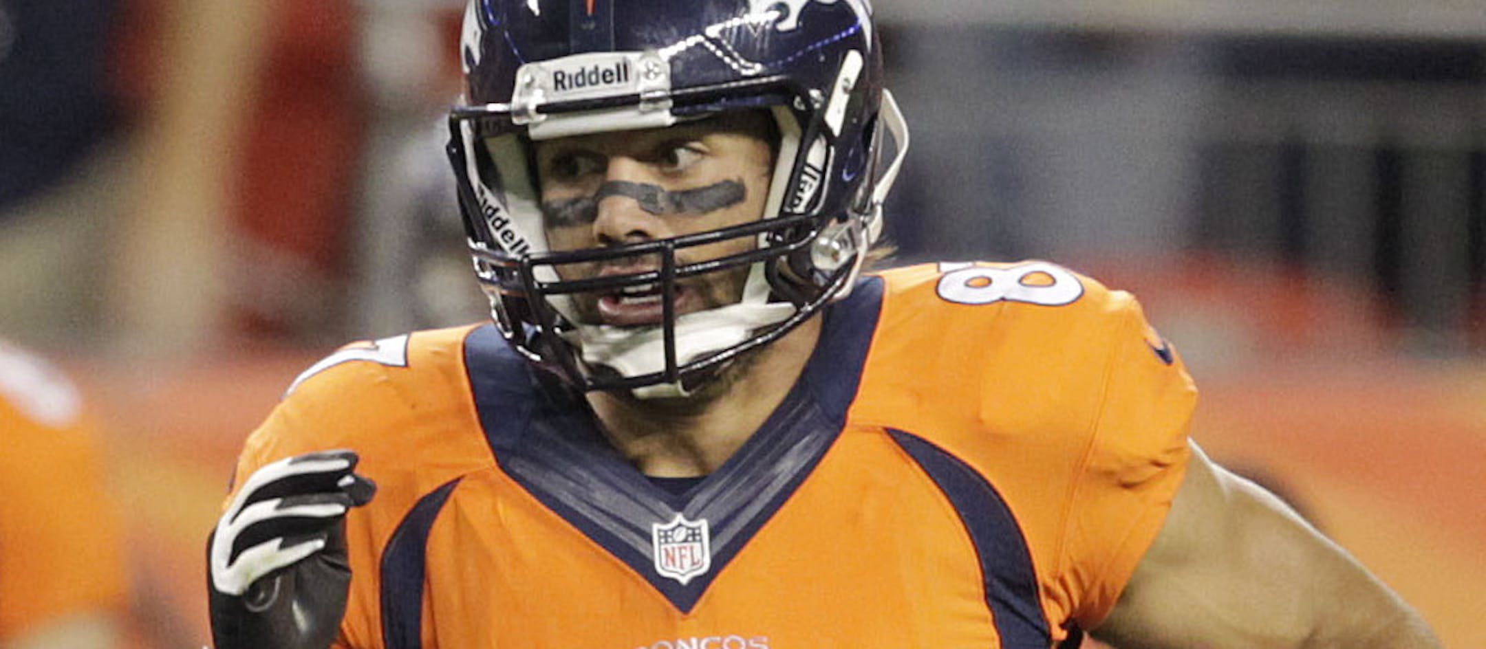 Denver Broncos wide receiver Eric Decker (87) runs the ball up field against the Oakland Raiders on his way to a first down in the second quarter of an NFL football game, Monday, Sept. 23, 2013, in Denver. (AP Photo/Joe Mahoney)