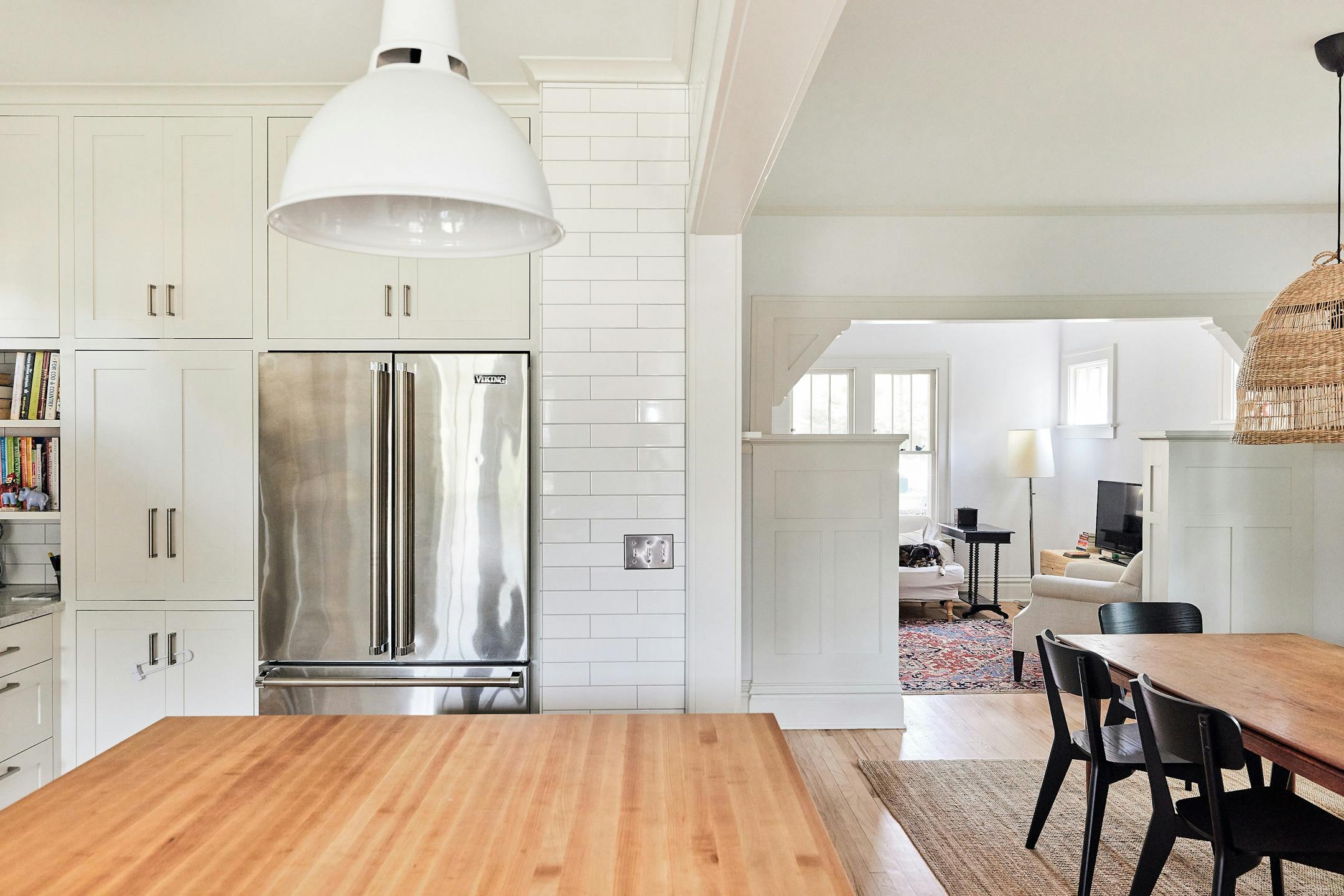 Merriam Park Cottage Renewal, a 2024-2025 Home of the Month winner by Albertsson Hansen Architecture and Interior Design, is a modest 1 1/2-story house that gets an overhaul while maintaining its vintage feel. An addition to a 1916 St. Paul home increases the kitchen’s square footage, adds a small covered porch with easier access to the backyard and expands the second floor to accommodate three bedrooms. Existing spaces are opened up to create better flow between gathering areas. White shaker-style cabinets and trim, as well as tall windows, add airiness and lightness.