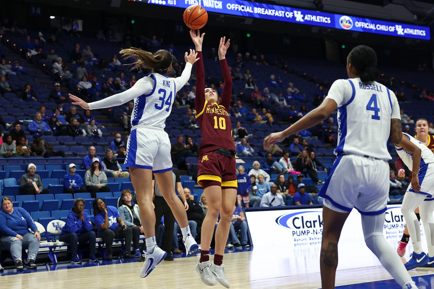 Minnesota guard Mara Braun (10) shoots over Kentucky guard Emma King (34) during an NCAA college basketball game Wednesday, Dec. 6, 2023, in Lexington, Ky. (Silas Walker/Lexington Herald-Leader via AP)