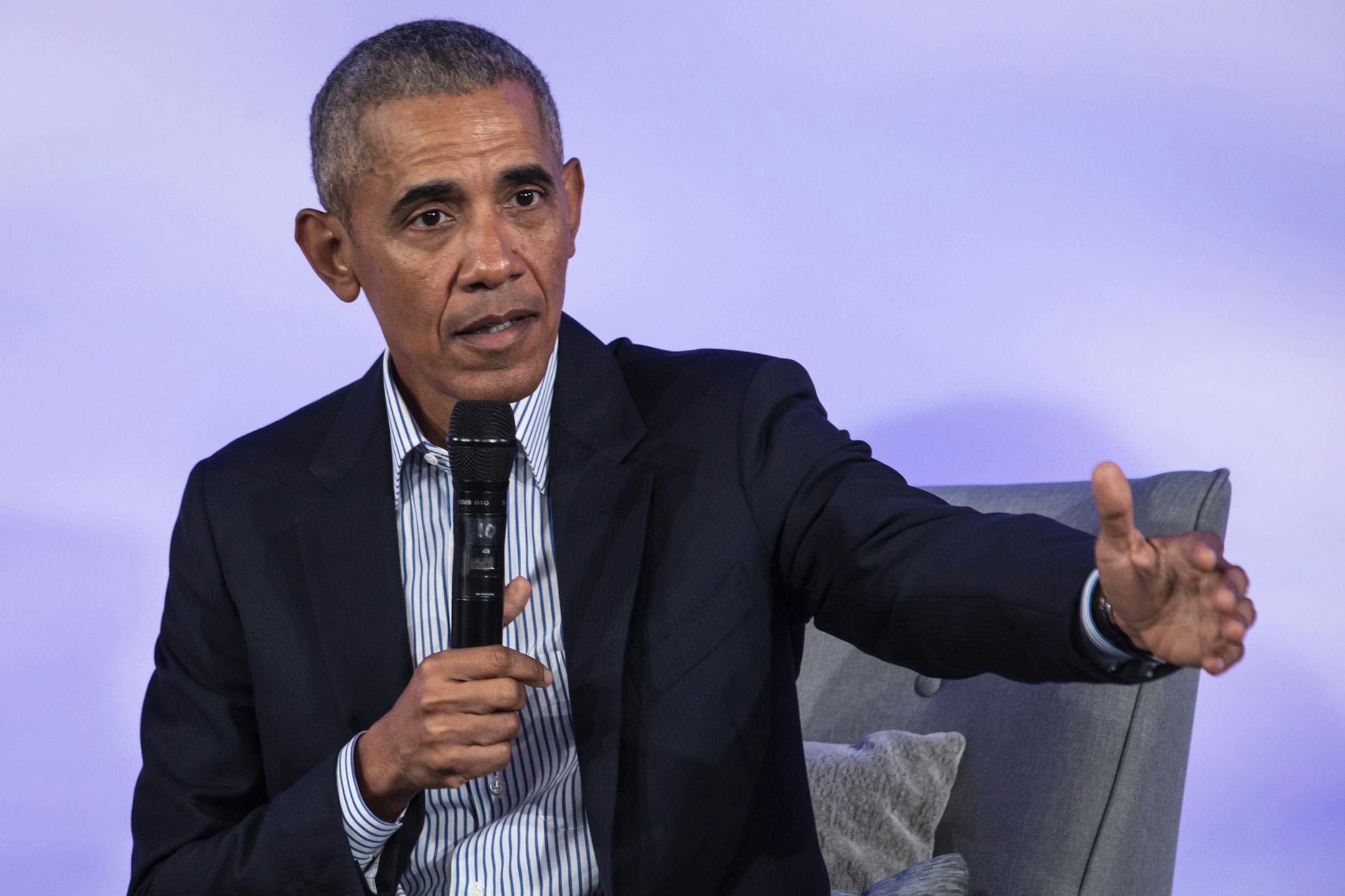 FILE - In this Oct. 29, 2019, file photo, former President Barack Obama speaks during the Obama Foundation Summit at the Illinois Institute of Technology in Chicago. Obama reiterated a warning about the adoption of &#x201c;purity tests&#x201d; in the Democratic presidential primary, which he said are likely to alienate voters needed to defeat President Donald Trump next year. (Ashlee Rezin Garcia/Chicago Sun-Times via AP)