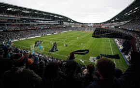Loons fans wave their scarves at Allianz Field