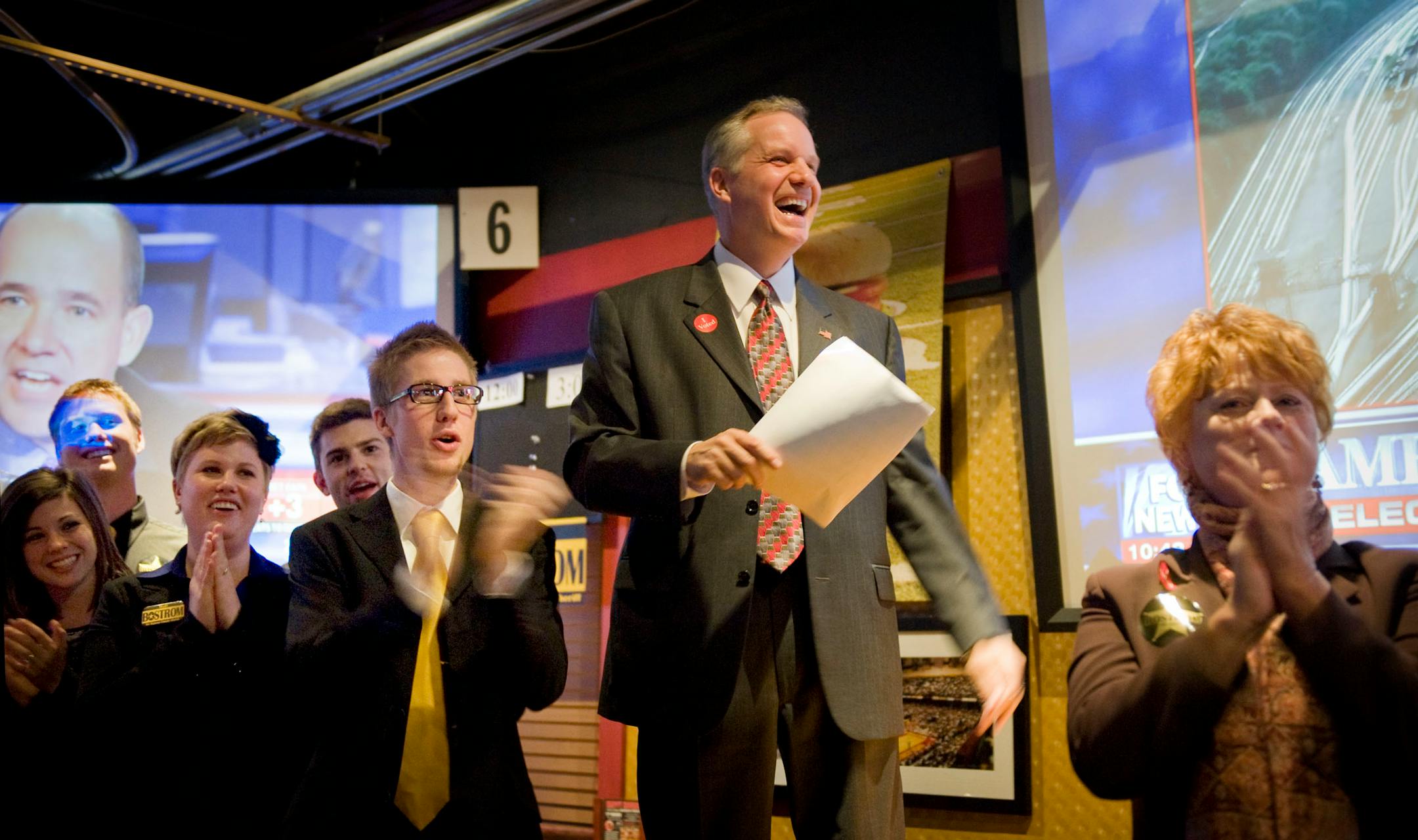 Surrounded by family members, Matt Bostrom spoke to supporters Tuesday night at Joe Sensor's Sports Grill in Roseville. L to R are daughter in law Jodi Bostrom, son Grant Bostrom, daughter Emily LaBerge, son in law Andrew LaBerge and son Luke Bostrom. On the right is wife Cheryl Bostrom.