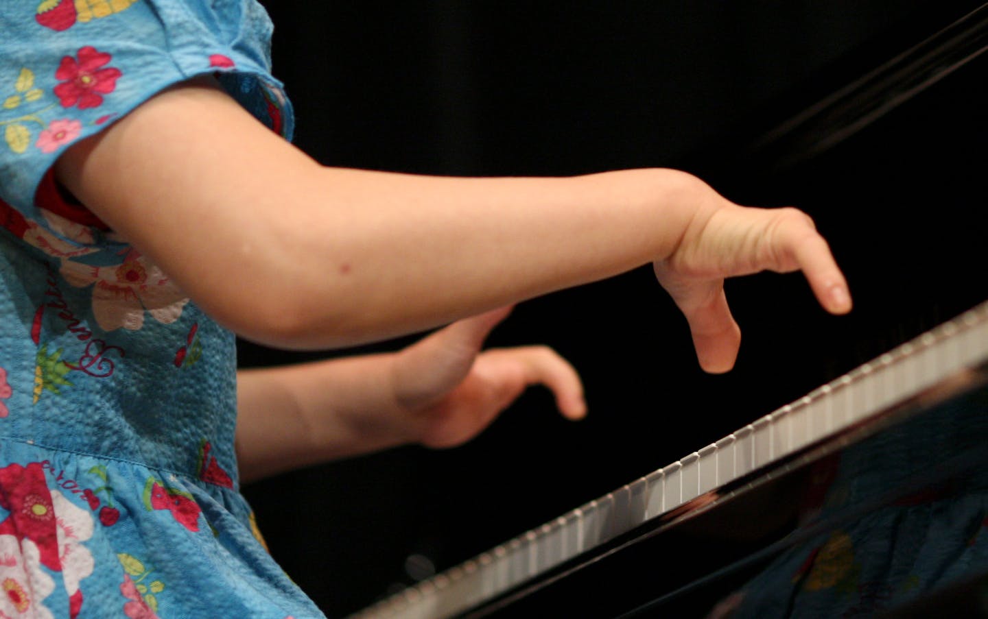 Hee Ah Lee performing an excerpt from Beethoven's "Ode to Joy" for the drama students at Valley View Middle School in Edina.