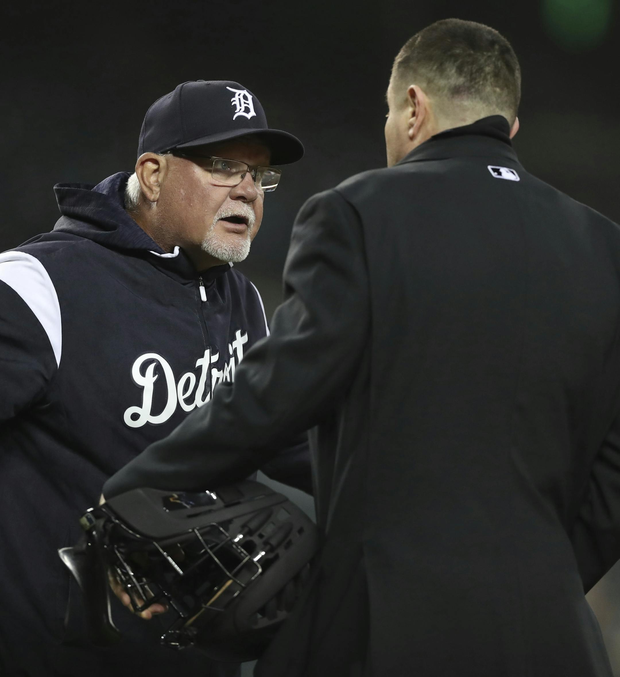 Detroit Tigers manager Ron Gardenhire, left, argues with home plate umpire Carlos Torres after being ejected during the fifth inning of the second game of a baseball doubleheader against the Seattle Mariners, Saturday, May 12, 2018, in Detroit. (AP Photo/Carlos Osorio)