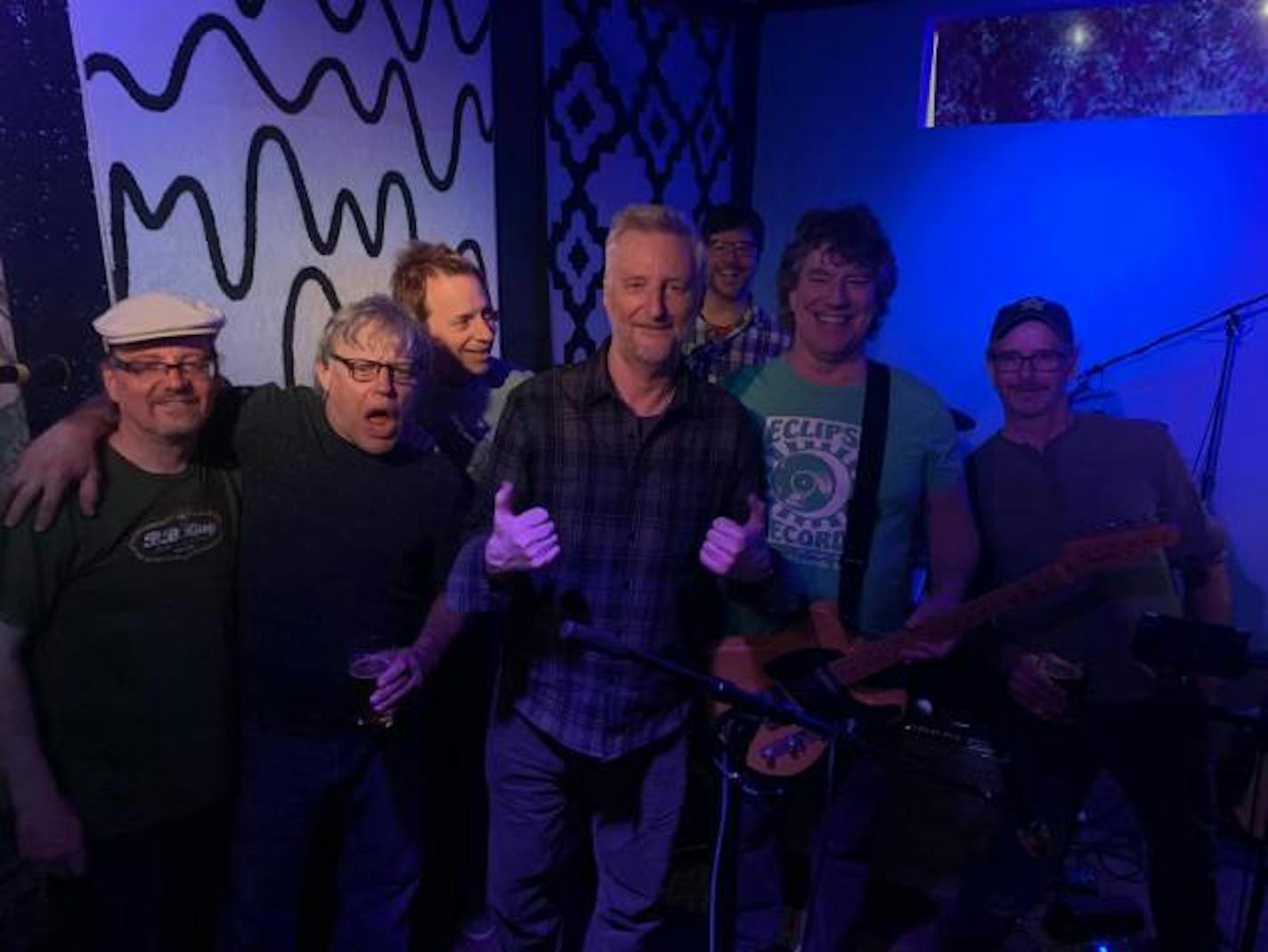 Billy Bragg, center, gave his blessing to St. Dominic's Trio in April at the Driftwood Char Bar. / Photos by Jim Walsh