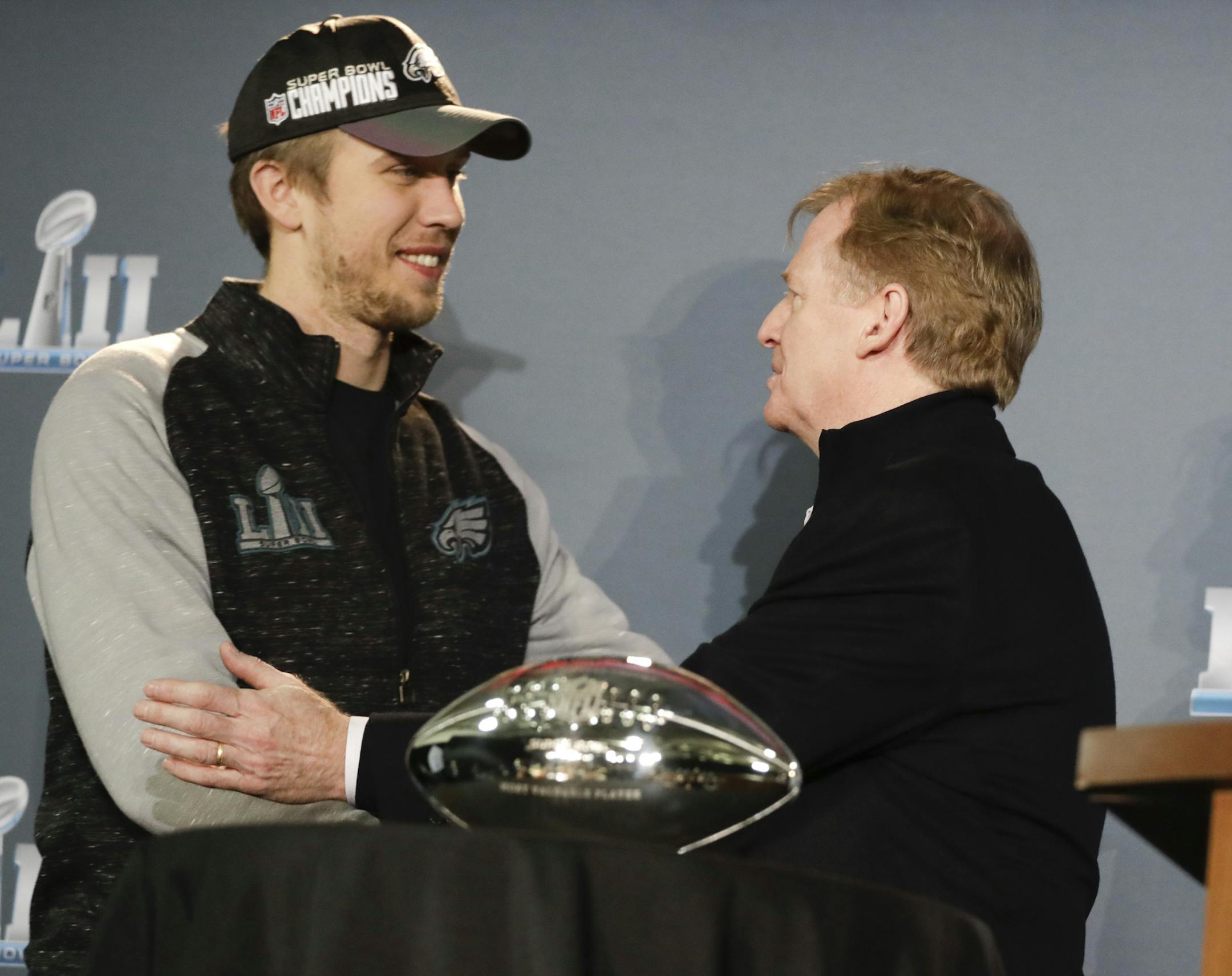 NFL Commissioner Roger Goodell and Eagles quarterback Nick Foles posed with his MVP trophy during a news conference after Super Bowl LII on Monday. The Eagles won 41-33.