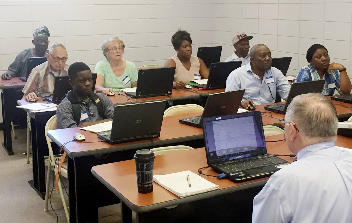 Tracy Godfrey leads a computer class through the WAFCS at Brooklyn United Methodist Church. (Courtesy of Edmund Ocansey)