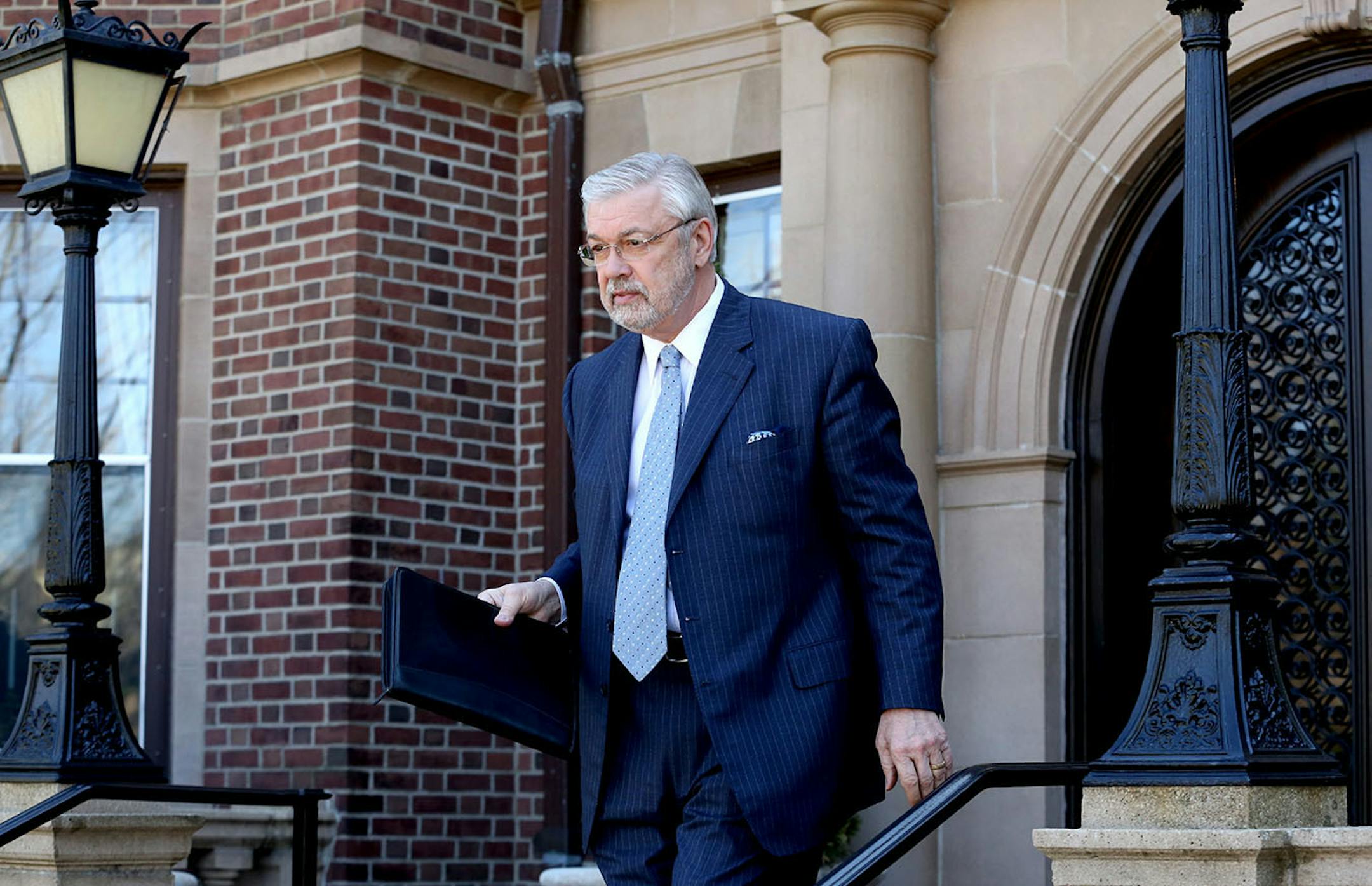 Dr. Bill McGuire, owner of Minnesota United FC, leaves the governor's mansion Tuesday, April 14, 2015, in St. Paul, Minn., after a meeting with Gov. Mark Dayton about building a new soccer stadium for the MLS franchise.