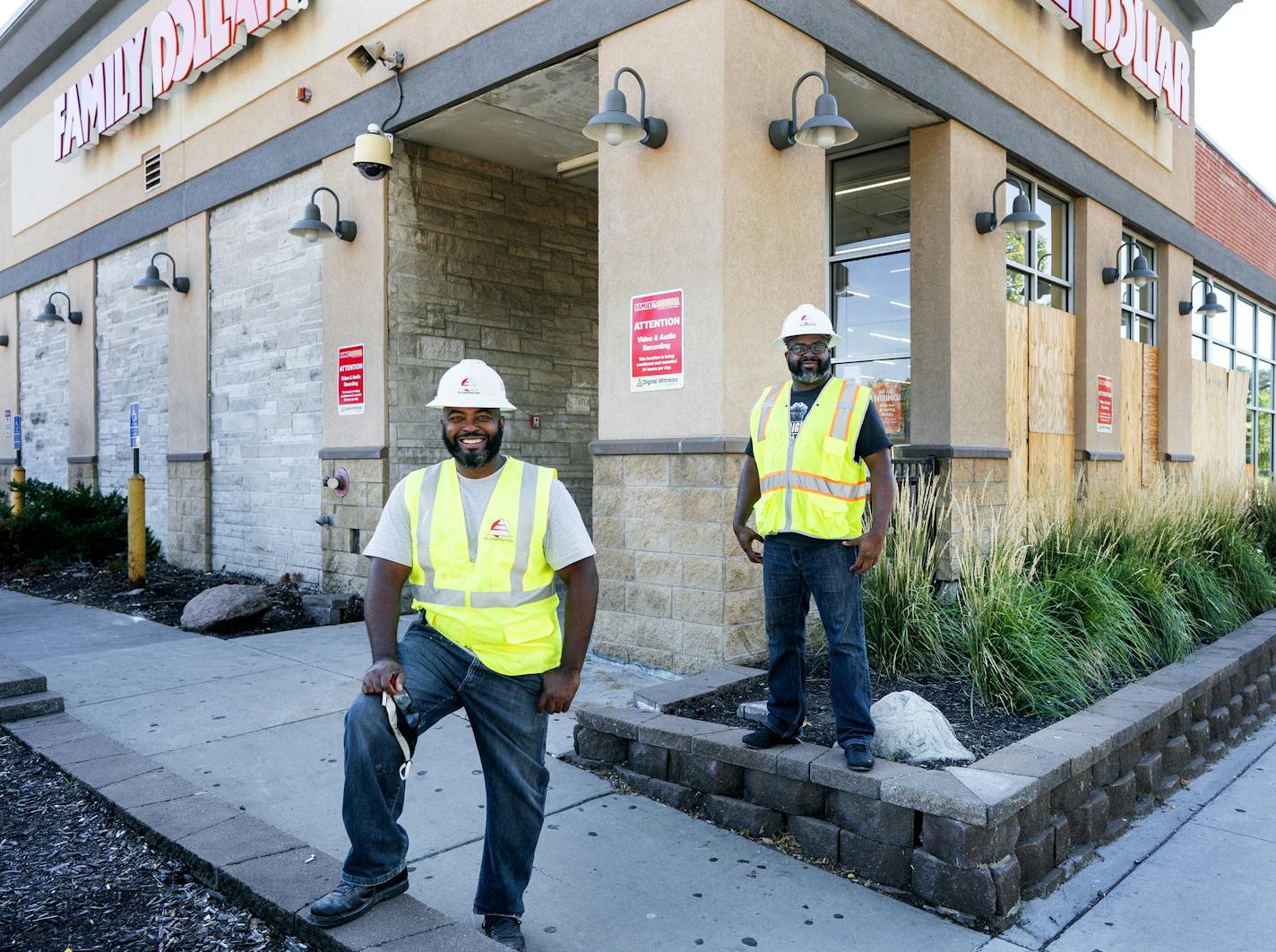 Lester Royal and Calvin Littlejohn, CEO of Tri-Construction, in north Minneapolis, where the firm is rebuilding a Family Dollar destroyed by riots.