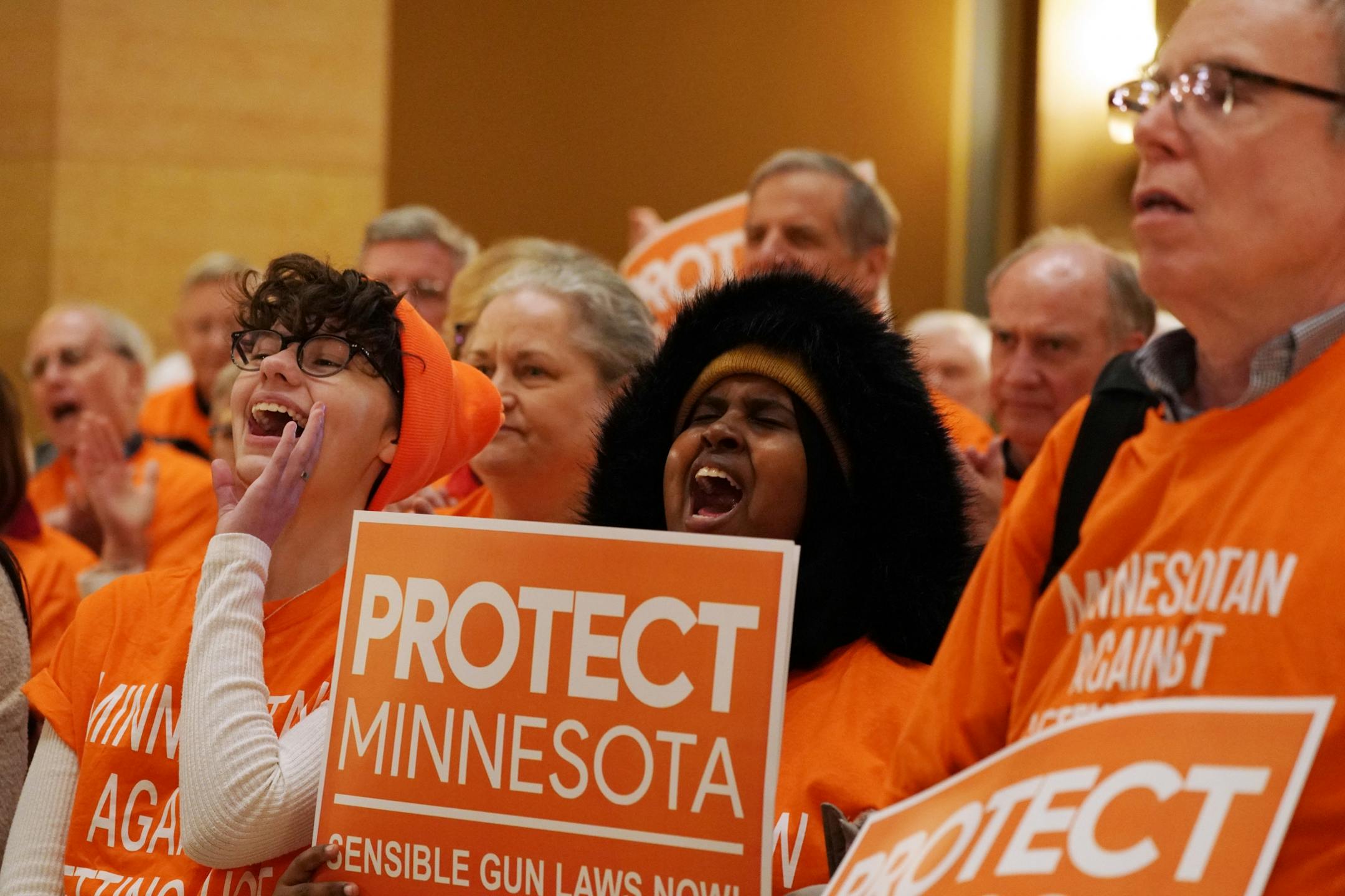 Supporters cheered during a gun control rally in the Capitol rotunda on the first day of the legislative session.