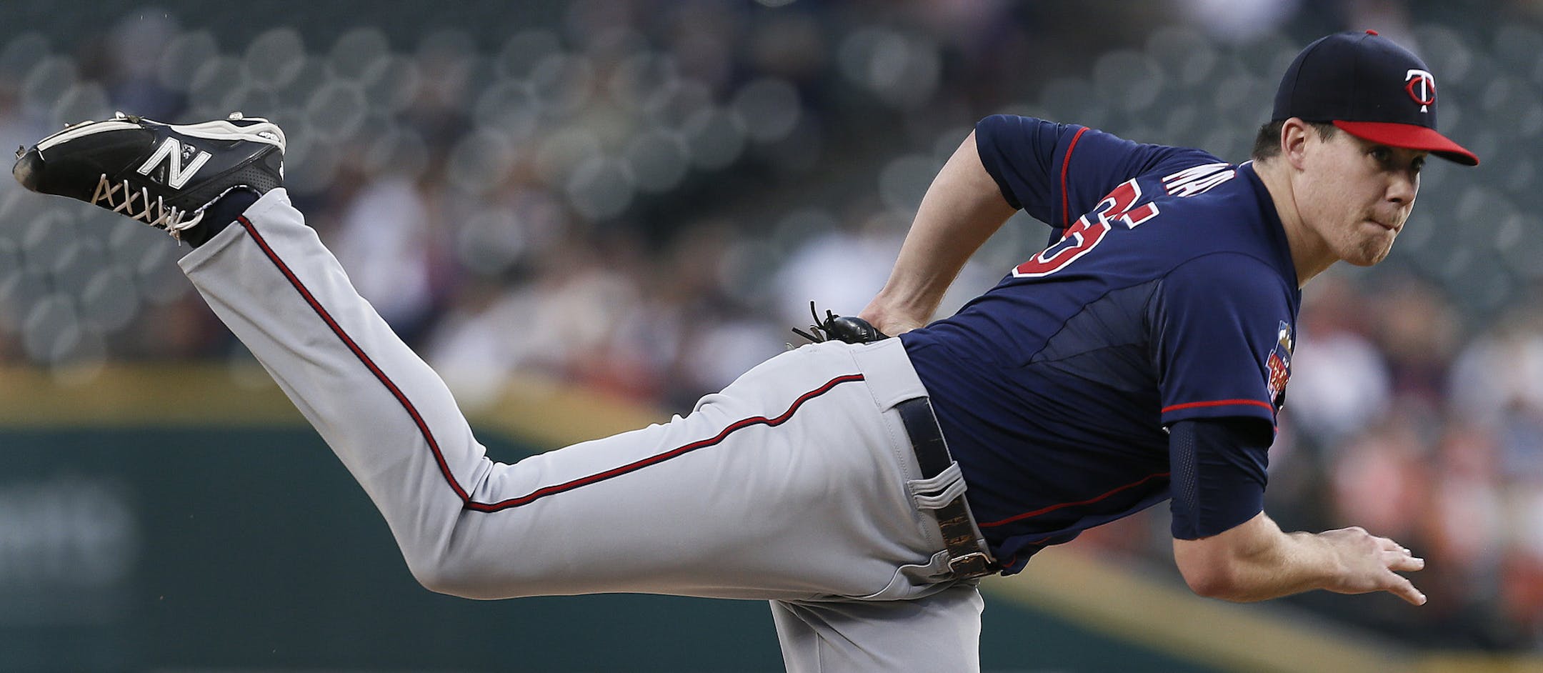 Minnesota Twins pitcher Trevor May throws against the Detroit Tigers in the first inning of a baseball game in Detroit, Thursday, Sept. 25, 2014. (AP Photo/Paul Sancya)