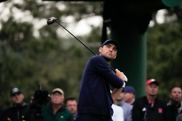Scottie Scheffler on the 18th tee during the second round at the Masters golf tournament on Friday, April 8, 2022, in Augusta, Ga. (AP Photo/Charlie R