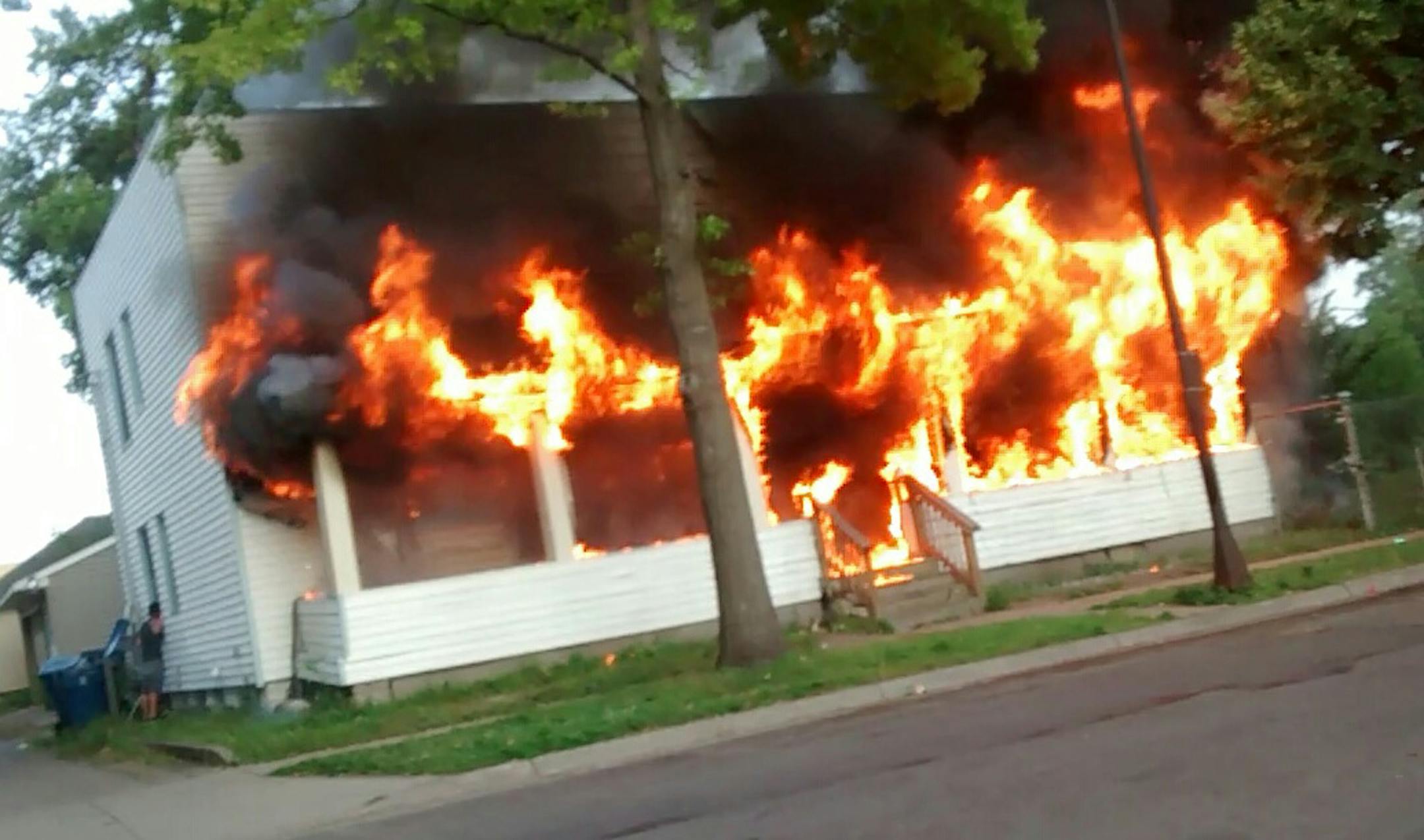 Flames shoot from this duplex in the 1200 block of Albemarle St. in St. Paul on Monday night.