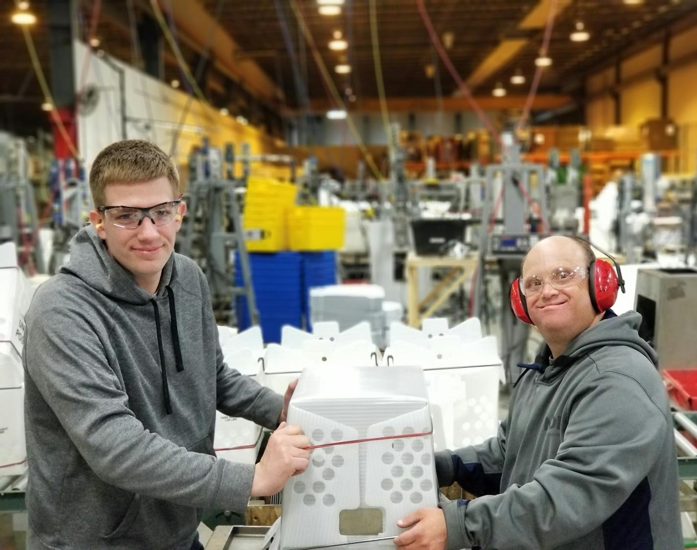 Noah Patton (left) and Kirk Jacobson work together at MDI's Northeast Minneapolis plant. Photo: MDI