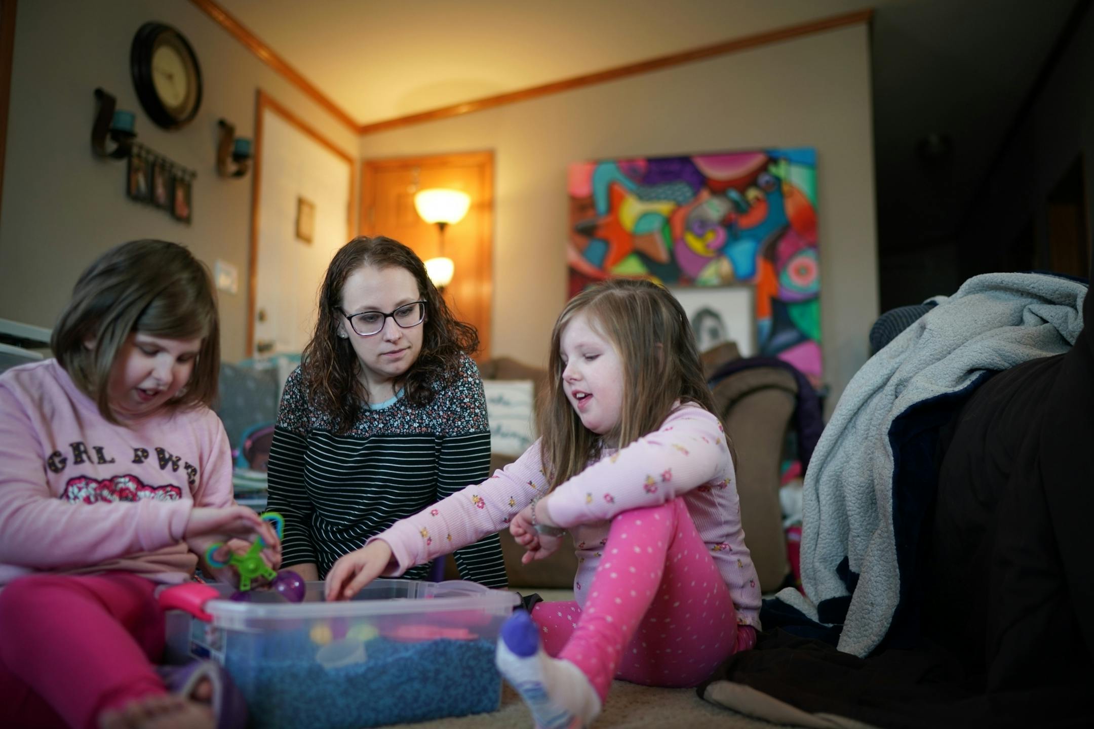 After both girls get home from school, Linsey Rippy has her daughters Madi, 12, and Sydney, 9, play with a sensory box to de-stress after their day at school. She can more easily talk to them about their day. After that they watch a little TV while Linsey gets dinner ready.