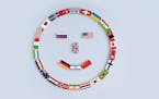 iStock
illustration of a smiley face from national flags on dominoes.