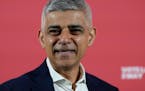 London Mayor Sadiq Khan walks off stage after delivering a policy speech about homelessness and housing during his campaign to be re-elected as Mayor 