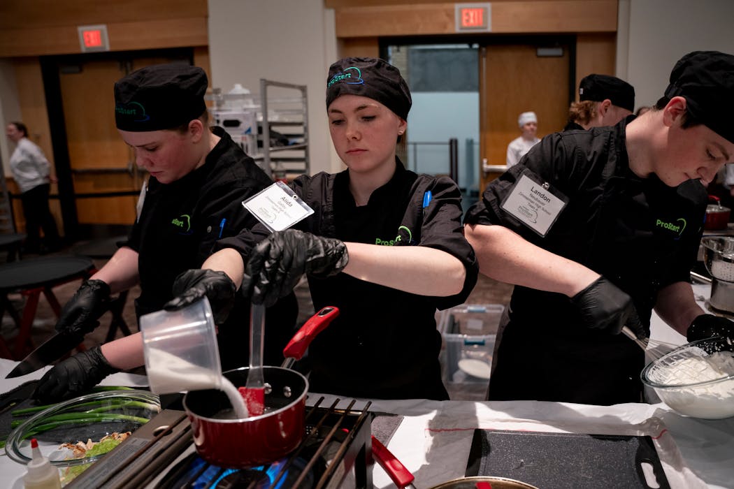Zimmerman High School students work on their three dishes during the Minnesota ProStart Invitational.
