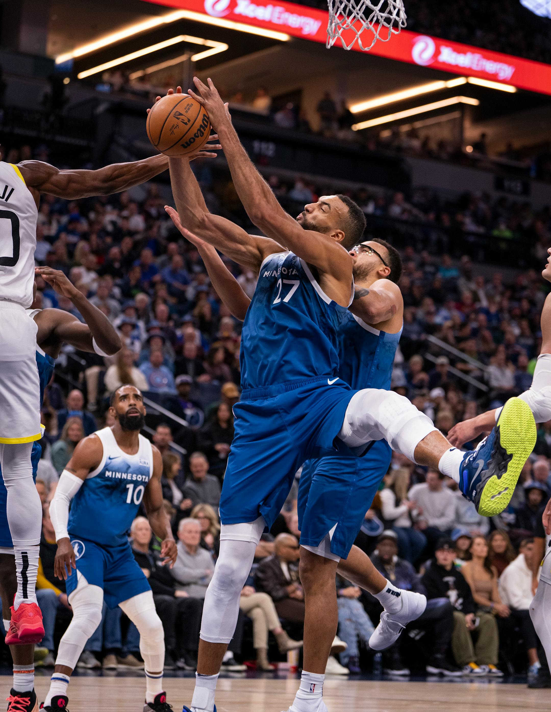 Minnesota Timberwolves center Rudy Gobert (27) gets a rebound during the first half of the game.