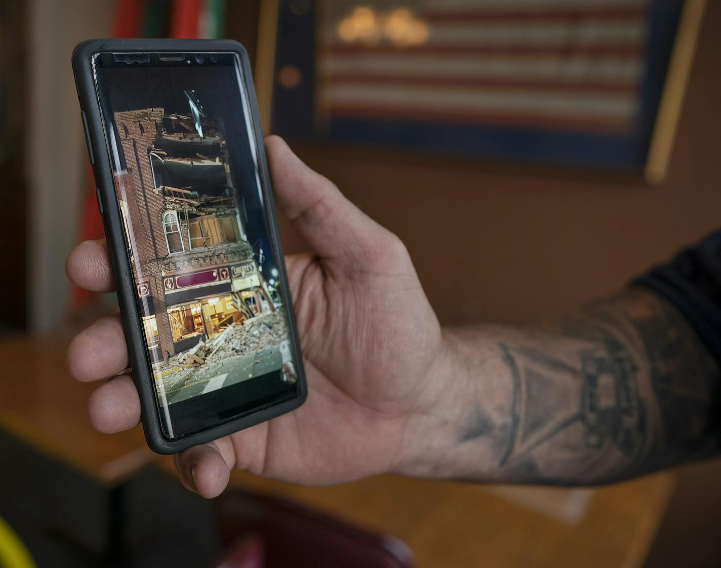 Doug Noreen, owner of the Liberty's Restaurant in downtown Red Wing, held a photo taken on his mobile phone of the damage done to the restaurant.