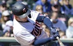 Minnesota Twins' Mitch Garver (18) connects for a double during the fifth inning of a baseball game against the Detroit Tigers Sunday, April 14, 2019,