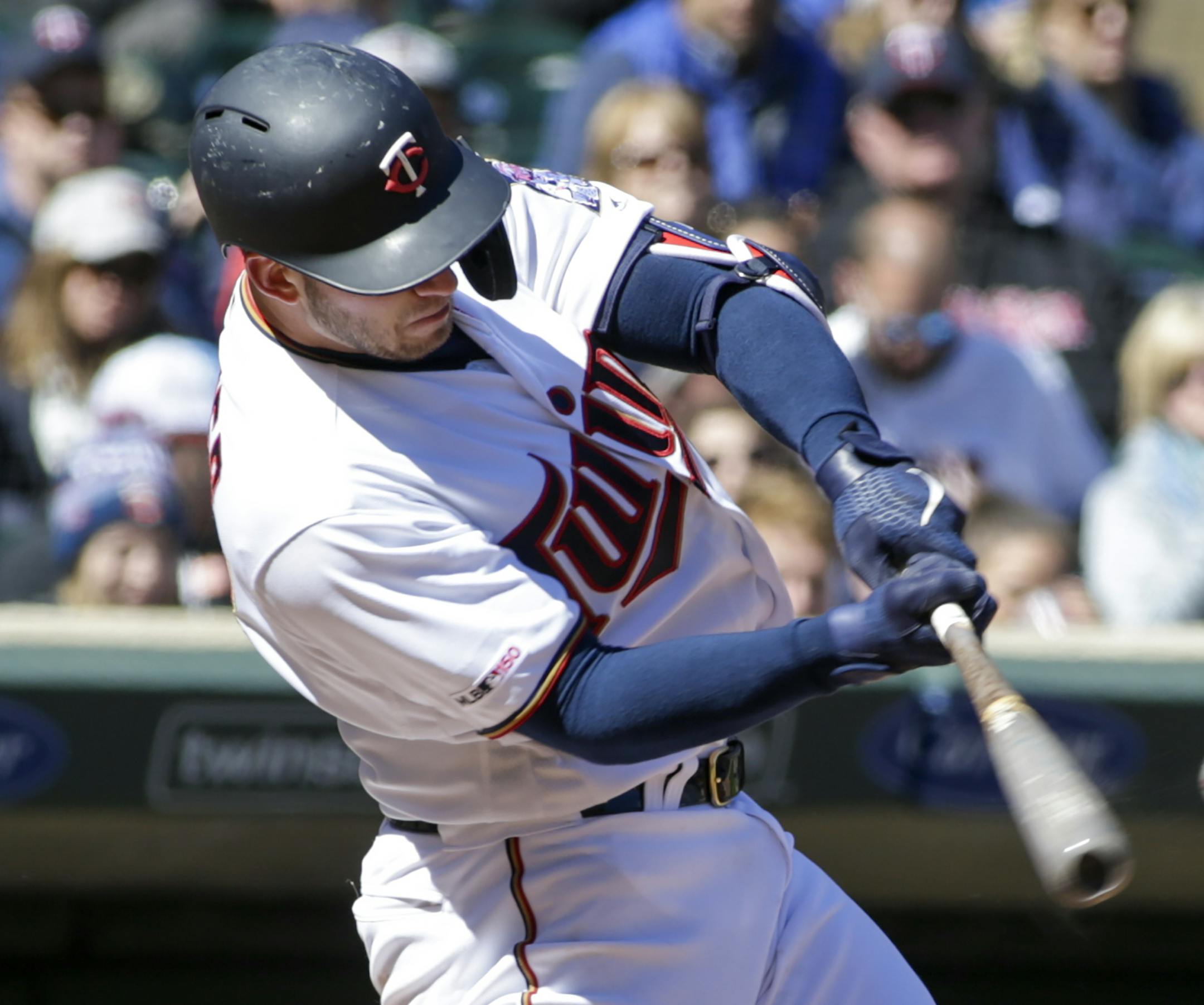 Minnesota Twins' Mitch Garver (18) connects for a double during the fifth inning of a baseball game against the Detroit Tigers Sunday, April 14, 2019, in Minneapolis. (AP Photo/Paul Battaglia)