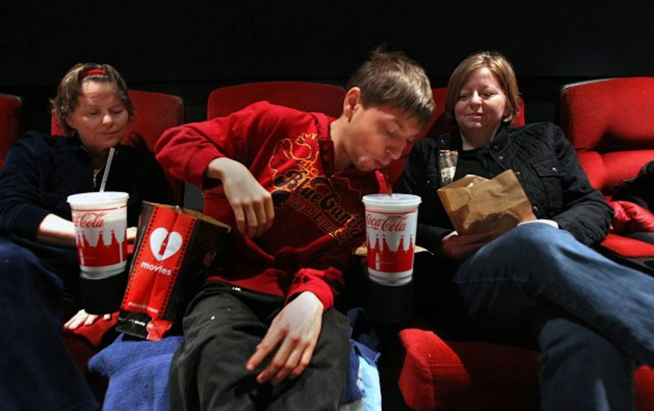Will Daily, 19, attended the AMC Roseville screening of "Mars Needs Moms" with his mother, Theresa Daily, left, of Roseville, and aunt Jodi Connelly of Minnetonka.