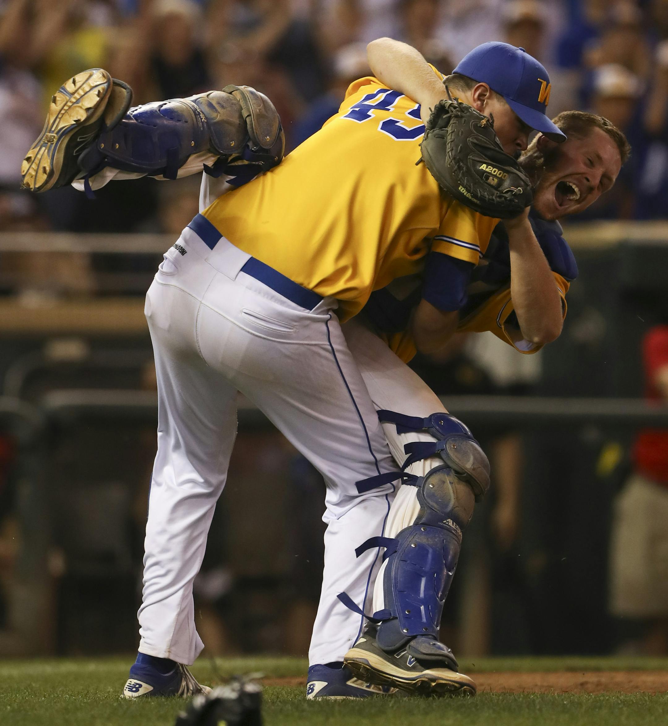 Wayzata pitcher Tommy Skoro and catcher Jake Marsh celebrated after the final out of the game. ] JEFF WHEELER ï jeff.wheeler@startribune.com Wayzata dominated Champlin Park 9-1 in their Class 4A Minnesota State High School League baseball tournament championship game Monday night, June 20, 2016 at Target Field in Minneapolis.