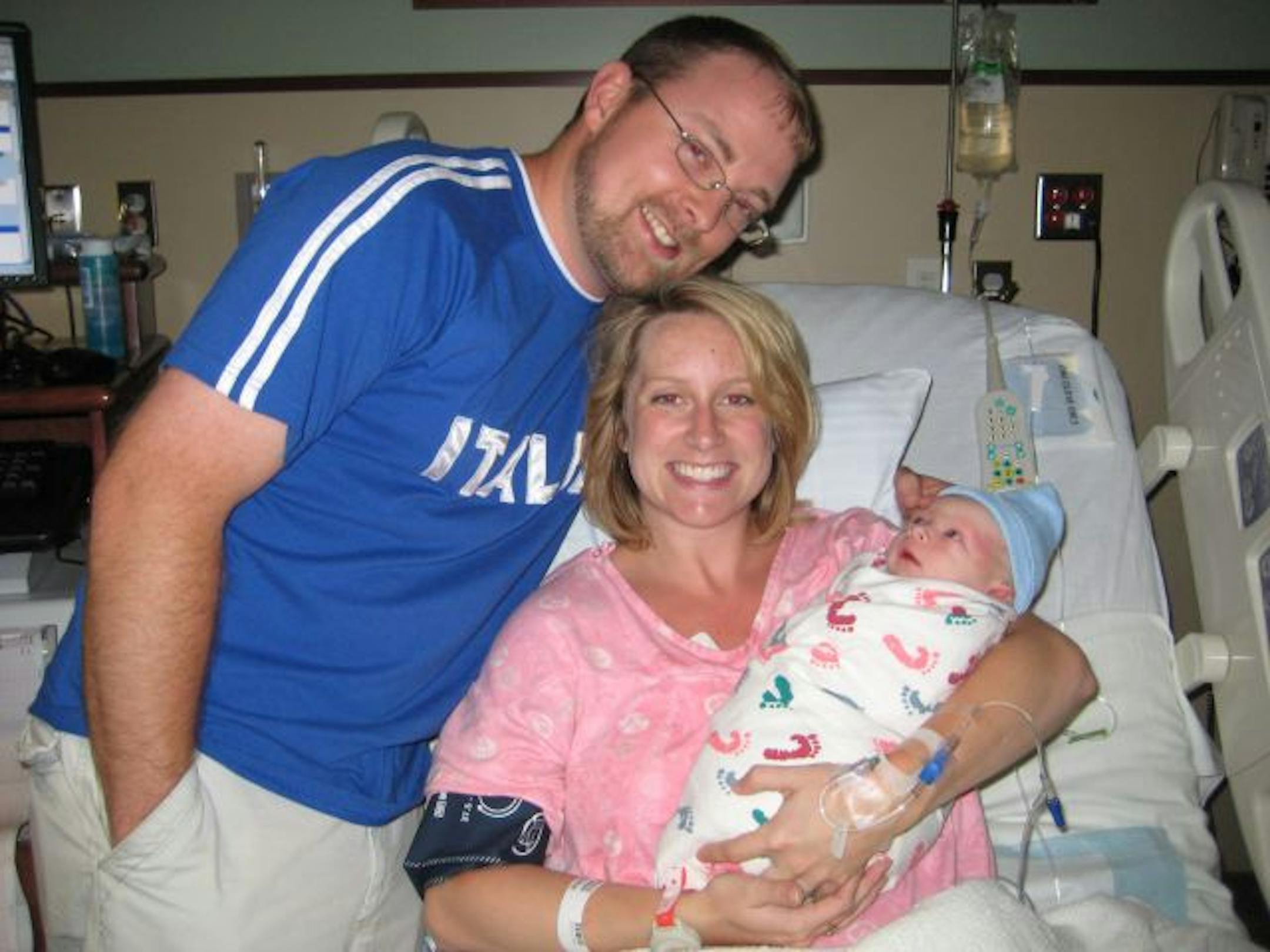 Michael Miller and his wife, Kim, after the birth of their son.