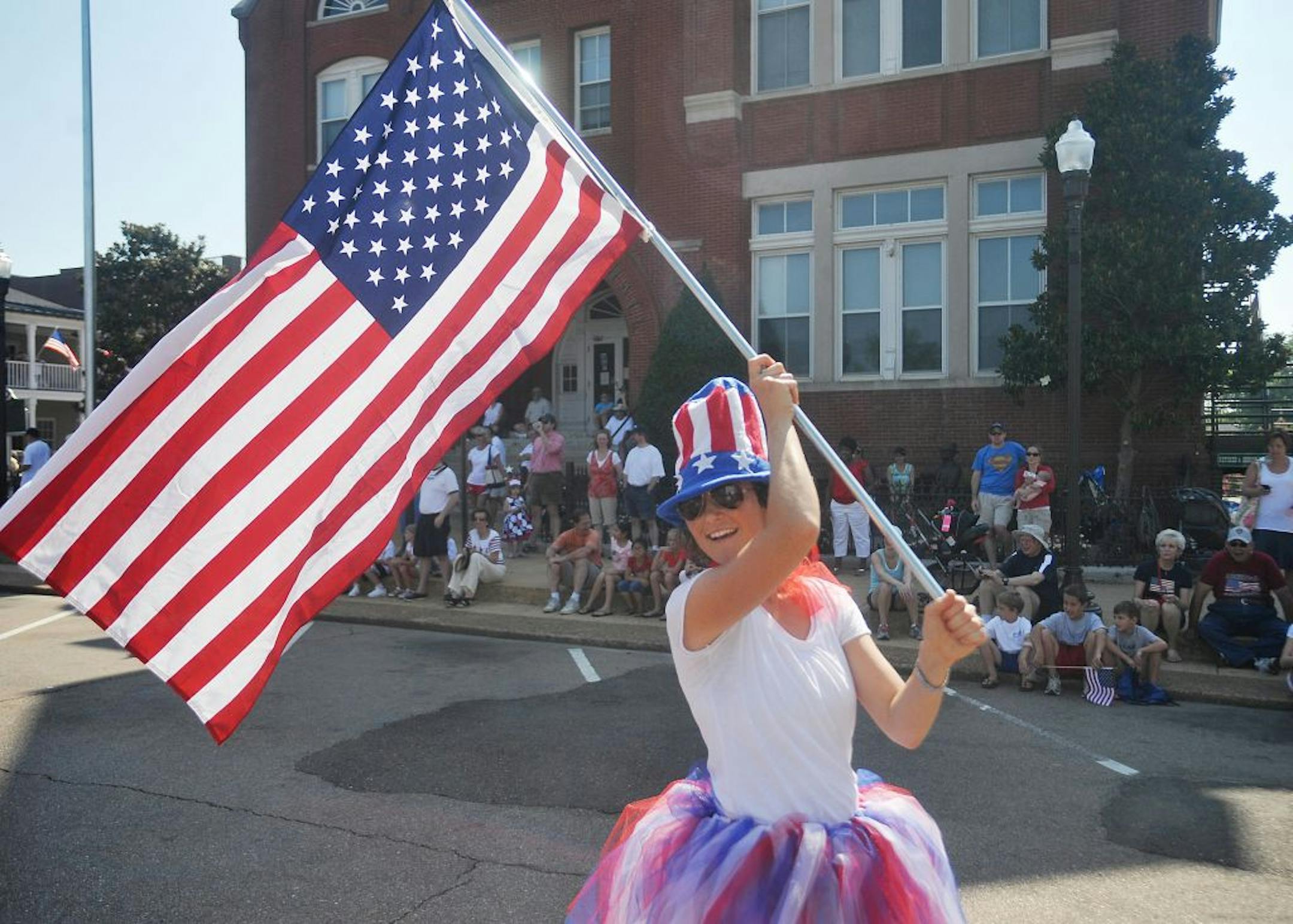 Holli Ratcliffe walks in the 4th of July parade in Oxford, Miss. on Monday, July 4, 2011.