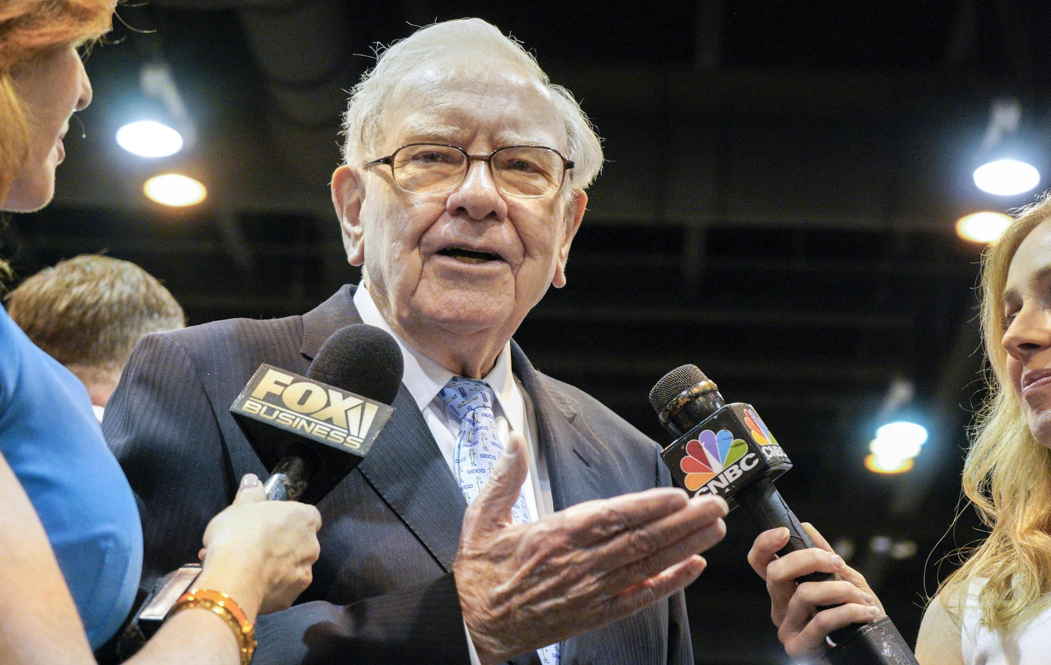 Warren Buffett, Chairman and CEO of Berkshire Hathaway, speaks to reporters during a tour of the exhibit floor at the CenturyLink Center in Omaha, Neb., Saturday, May 5, 2018, where Berkshire brands display their products and services. Tens of thousands of Berkshire Hathaway shareholders have arrived in Omaha for the annual shareholders meeting, where Buffett and his Vice-Chairman Charlie Munger preside over a Q&A session. (AP Photo/Nati Harnik)