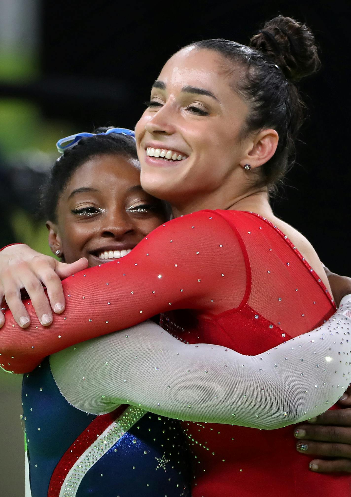 OLY BEST GALLERY FOR MONDAY- USA's Simone Biles won the all around title in women's gymnastics and her teammate Alexandra Raisman took home the silver. Here, they embrace after it was announced in the arena. ] 2016 Summer Olympic Games - Rio Brazil brian.peterson@startribune.com Rio de Janeiro, Brazil - 08/11/2016