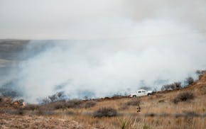 Firefighters execute a prescribed burn last week in response to the Smokehouse Creek fire, the largest wildfire in Texas history. Xcel says its equipm