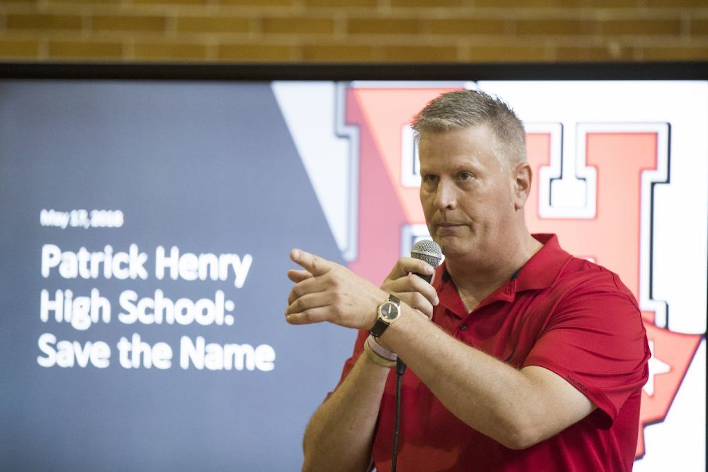 Mike Finke, part Patrick Henry class of 1985, speaks on behalf of the save the name coalition.