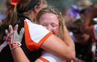 Farmington infielder Olivia Hazelbaker celebrated with Emma Frost after their victory. ] MARK VANCLEAVE &#xef; mark.vancleave@startribune.com * The Fa