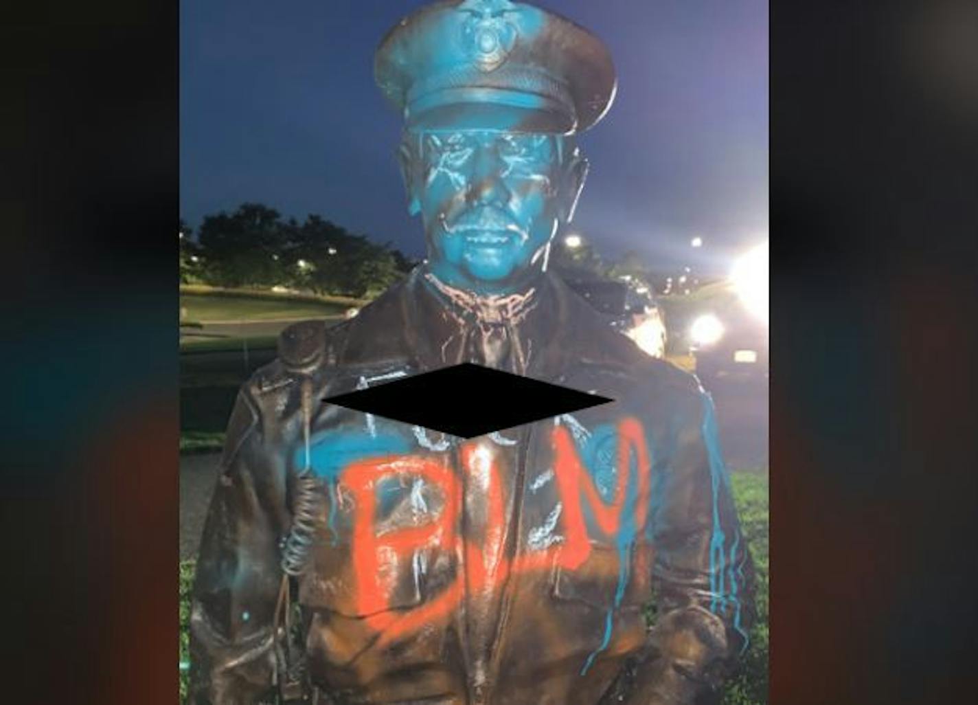 Police released a photo of an officer statue that was tagged with graffiti. The image was posted on Facebook and Twitter by police with a profanity obscured.