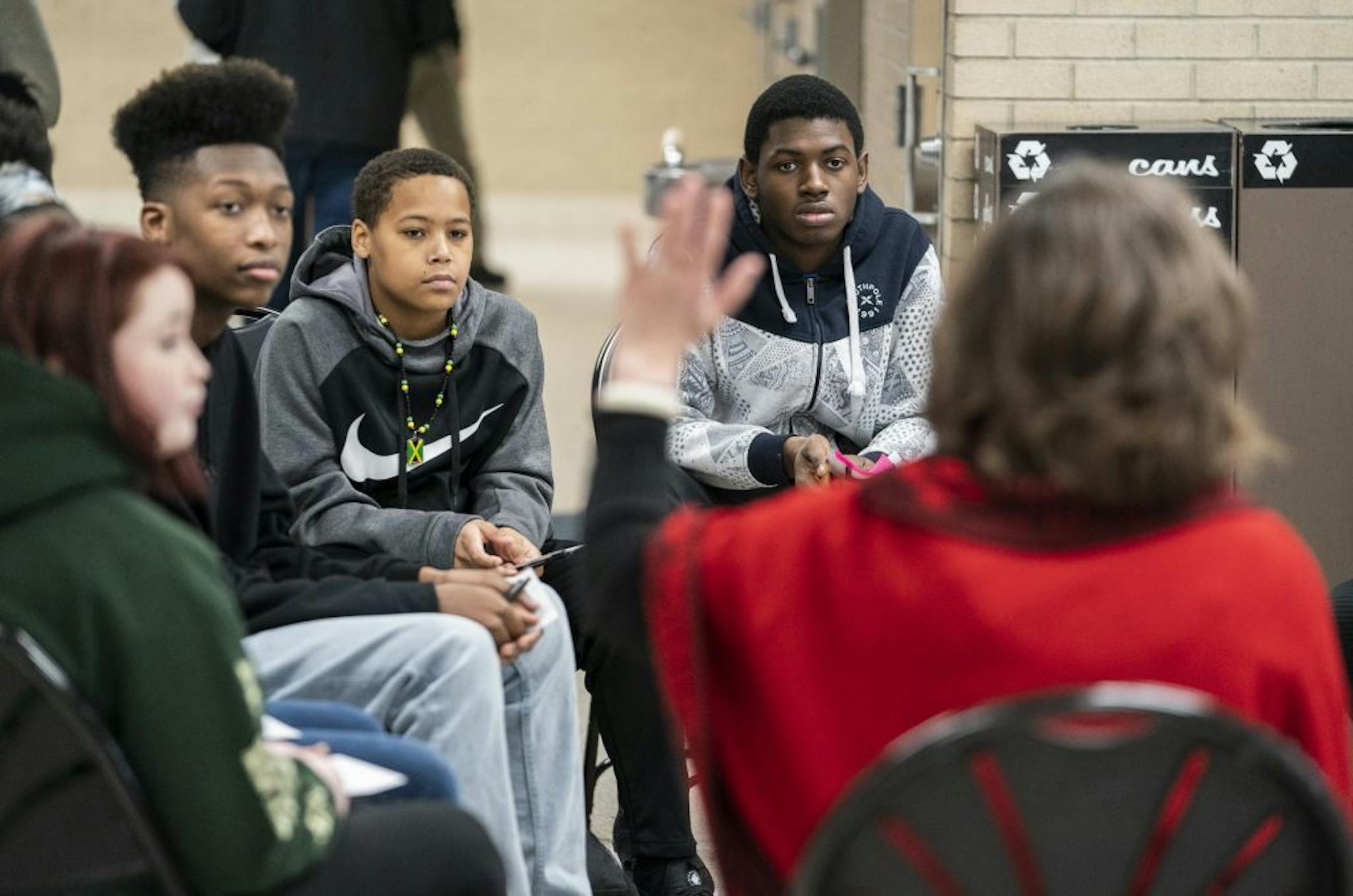 Student from the left; Ty Walker, Taylor Fletcher and Elvis Ohagwa listened to Minnesota's new education commissioner, Mary Cathryn Ricker, during a listening session at Hopkins West Junior High in Minnetonka, Minn., on Monday, February 11, 2019.