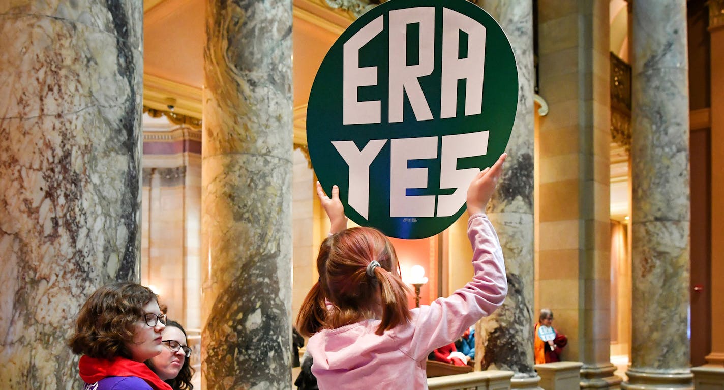 Push to pass the Equal Rights Amendment on International Women's Day at the Capitol. ] GLEN STUBBE &#x2022; glen.stubbe@startribune.com Wednesday, March 8, 2017 Push to pass the Equal Rights Amendment on International Women's Day at the Capitol. Following a press conference calling for the passage of the long-sought Equal Rights Amendment, many women gathered in support are fanning out across the State Capitol. EDS, don't have this girls name. ORG XMIT: MIN1703081343510145