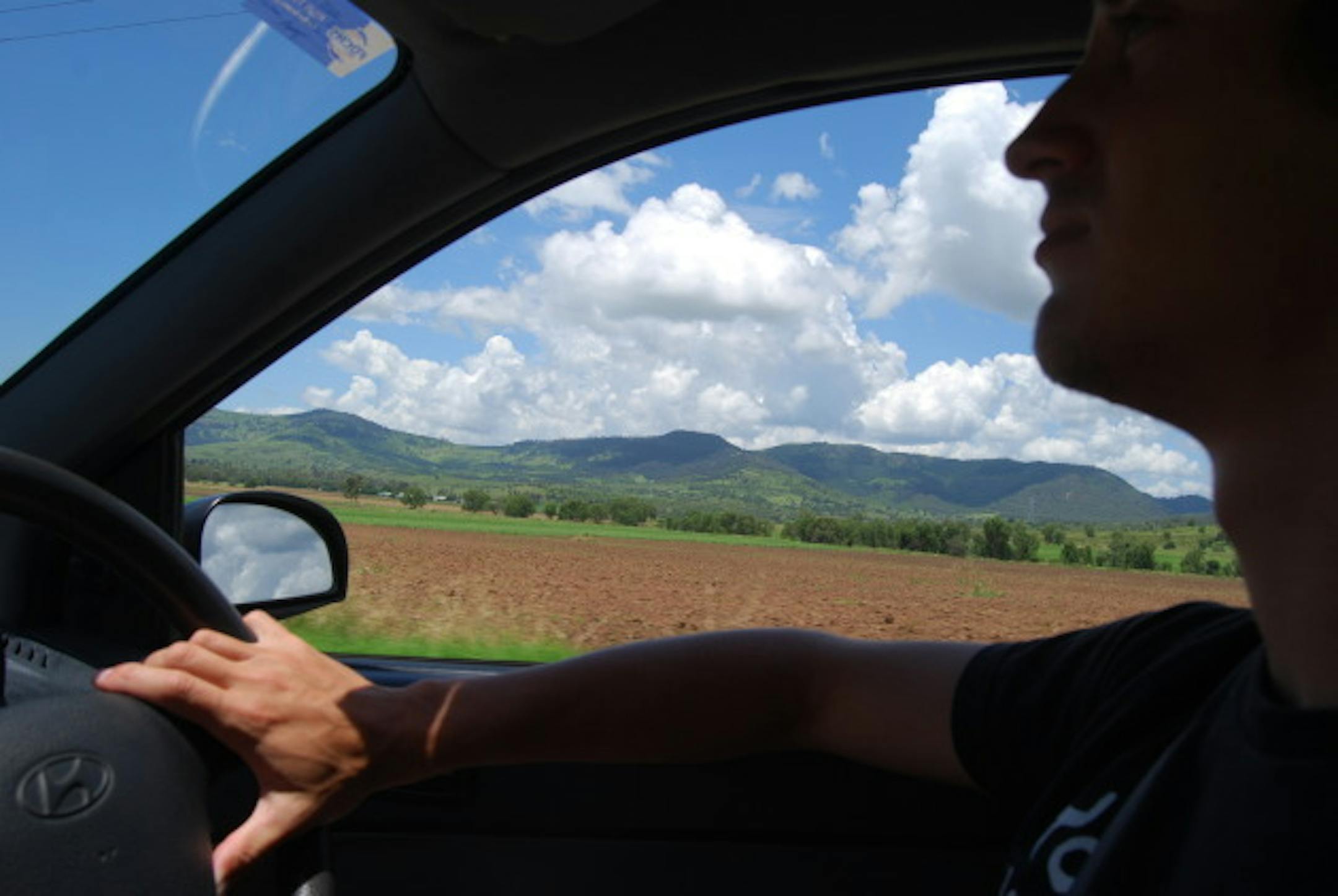 Dirt fields... and us driving.
