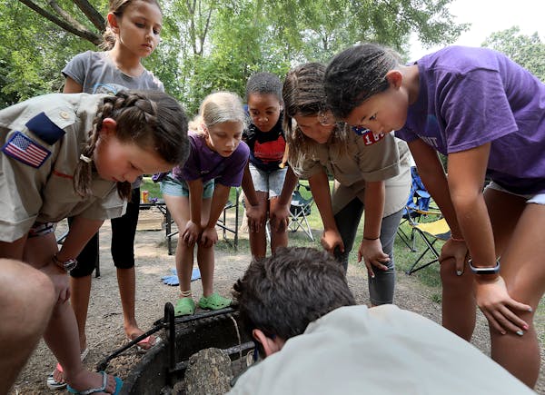 Members of Edina cub scout pack 168 are among the first girls in the country to be scouts - and they are holding their first campout, at Lake Auburn c
