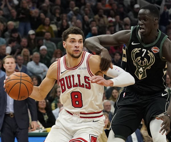 Chicago Bulls' Zach LaVine tries to drive past Milwaukee Bucks' Thon Maker during the second half of an NBA basketball game Friday, Nov. 16, 2018, in 