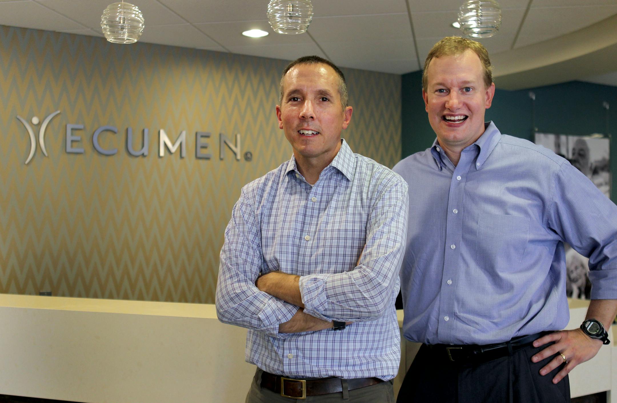 Ernest Grumbles, left, co-founder of MOJO Minnesota, and Eric Schubert, vice president of communications and public affairs of Ecumen, pose for a portrait at the Ecumen headquarters in Shoreview Minn., on Wednesday, July 17, 2013. The companies are teaming up to try to fast-track AgePower Tech Search, a collaboration addressing aging issues. ] (ANNA REED/STAR TRIBUNE) anna.reed@startribune.com (cq)