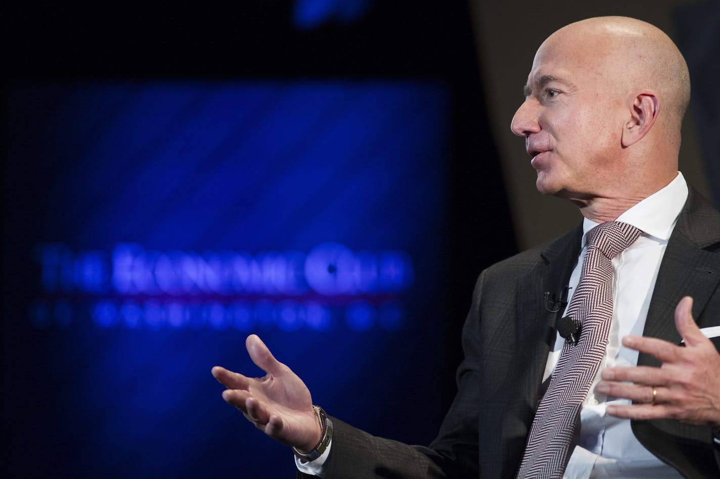 Jeff Bezos, Amazon founder and CEO, speaks at The Economic Club of Washington's Milestone Celebration in Washington, Thursday, Sept. 13, 2018. Bezos said that he is giving $2 billion to start the Bezos Day One Fund which will open preschools in low-income neighborhoods and give money to nonprofits that helps homeless families. (AP Photo/Cliff Owen) ORG XMIT: DCCO116