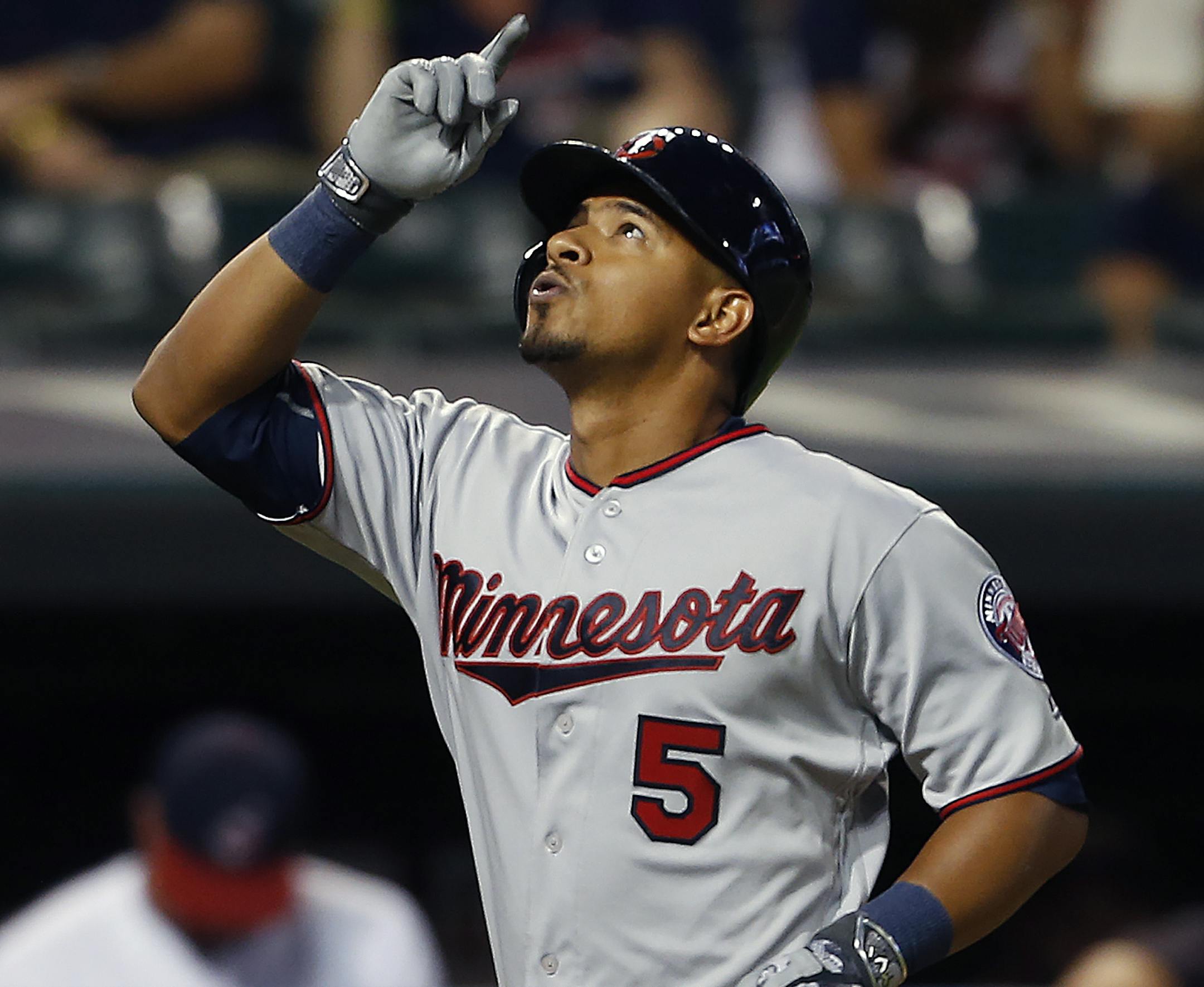 Minnesota Twins' Eduardo Escobar celebrates after hitting a two-run home run off Cleveland Indians relief pitcher Austin Adams during the ninth inning of a baseball game Tuesday, Aug. 2, 2016, in Cleveland. The Twins won 10-6. (AP Photo/Ron Schwane)
