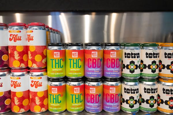 Cans of THC-infused beverages from various Minnesota breweries were on display at a Trail Magic Taproom Pop-Up on Dec. 14, 2022.