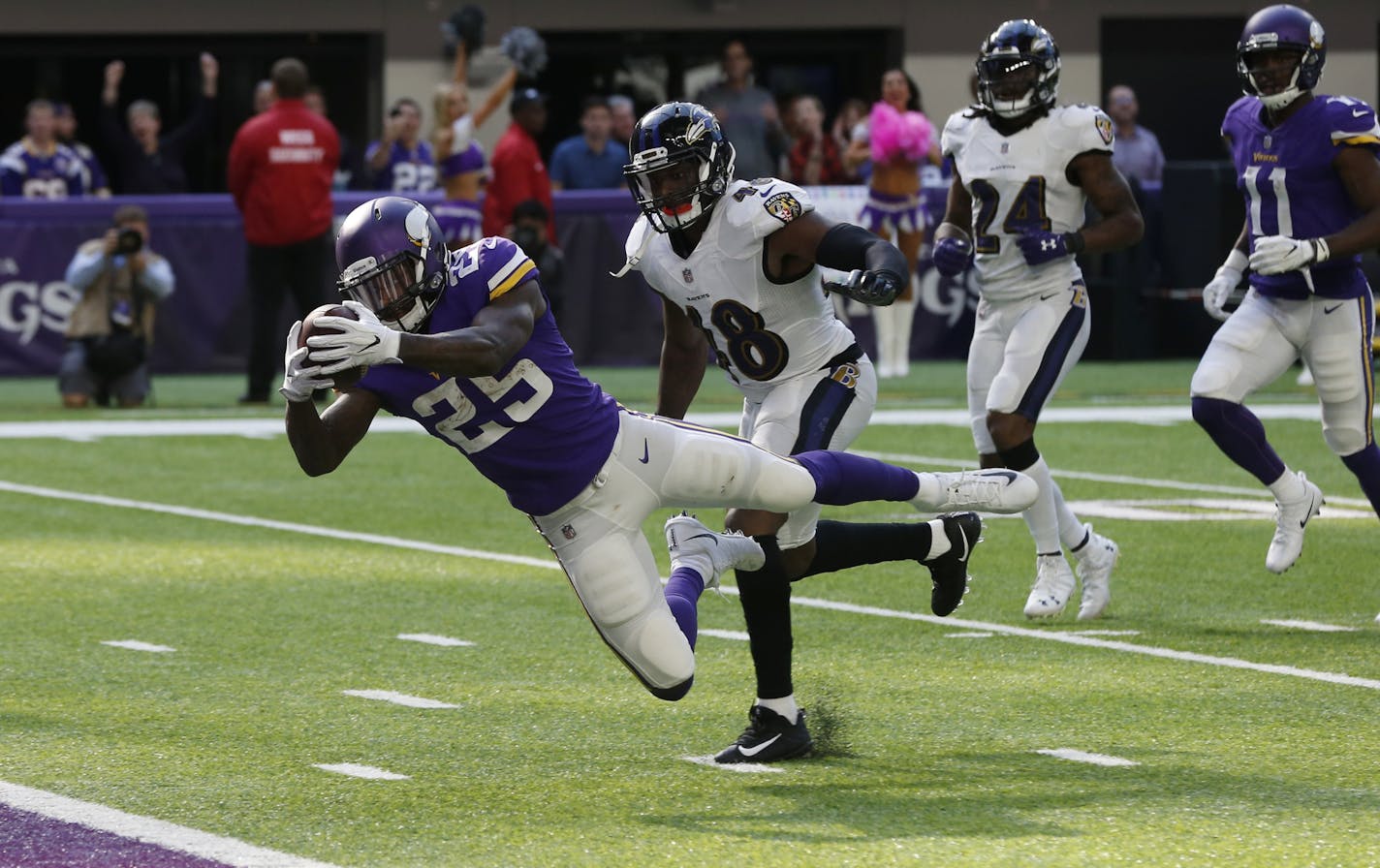 Minnesota Vikings running back Latavius Murray (25) runs from Baltimore Ravens outside linebacker Patrick Onwuasor (48) during a 29-yard touchdown run in the second half of an NFL football game, Sunday, Oct. 22, 2017, in Minneapolis. (AP Photo/Jim Mone)