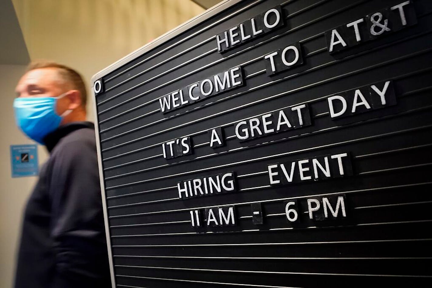 A sign welcomes job candidates to an AT&amp;T hiring event on April 28 in Richardson. The company was hiring for 300 jobs across the Dallas-Fort Worth area in retail, virtual sales and customer acquisition roles. (Smiley N. Pool/The Dallas Morning News/TNS) ORG XMIT: 18477227W ORG XMIT: MIN2106080940153618