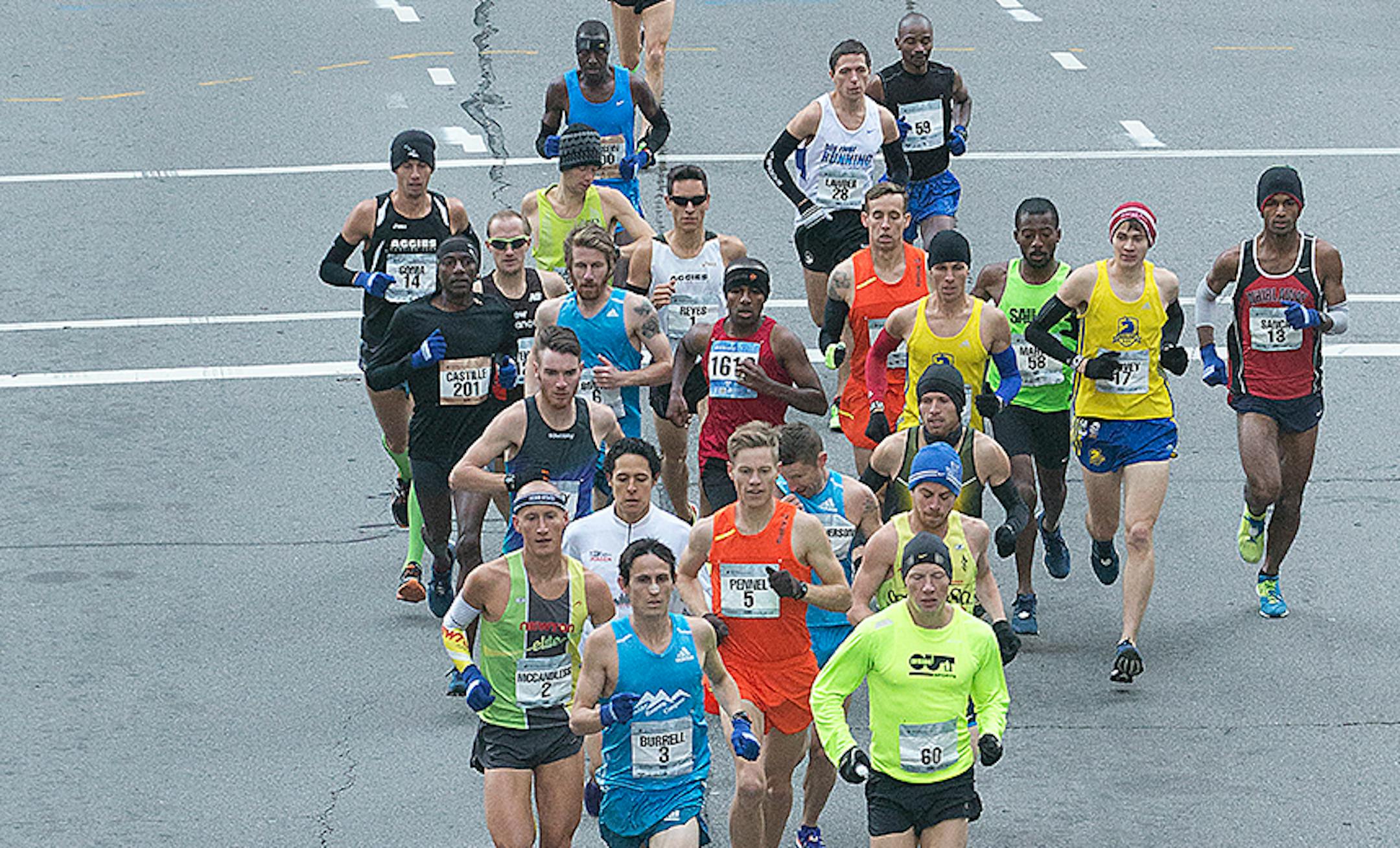 The identity of Twin Cities Marathon runner Stephen Kimando Muturi, No. 59 at top, wasn't disclosed until Monday.