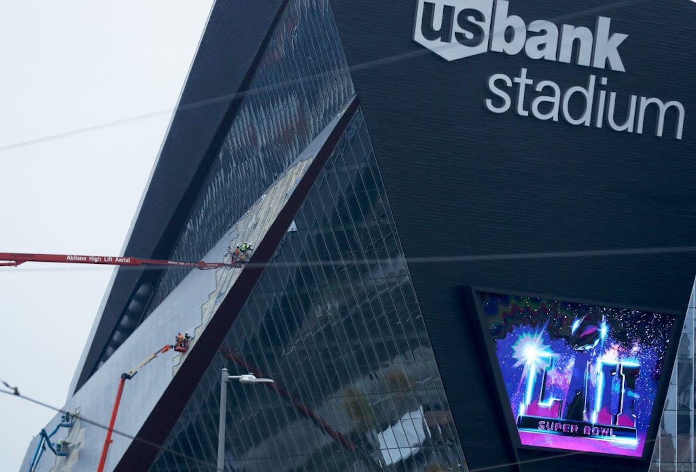 Construction workers replace faulty exterior panels on US Bank Stadium in preparation for Super Bowl LII, held in Minneapolis in February of 2018 and seen Thursday, Oct. 12, 2017, in Minneapolis, MN.