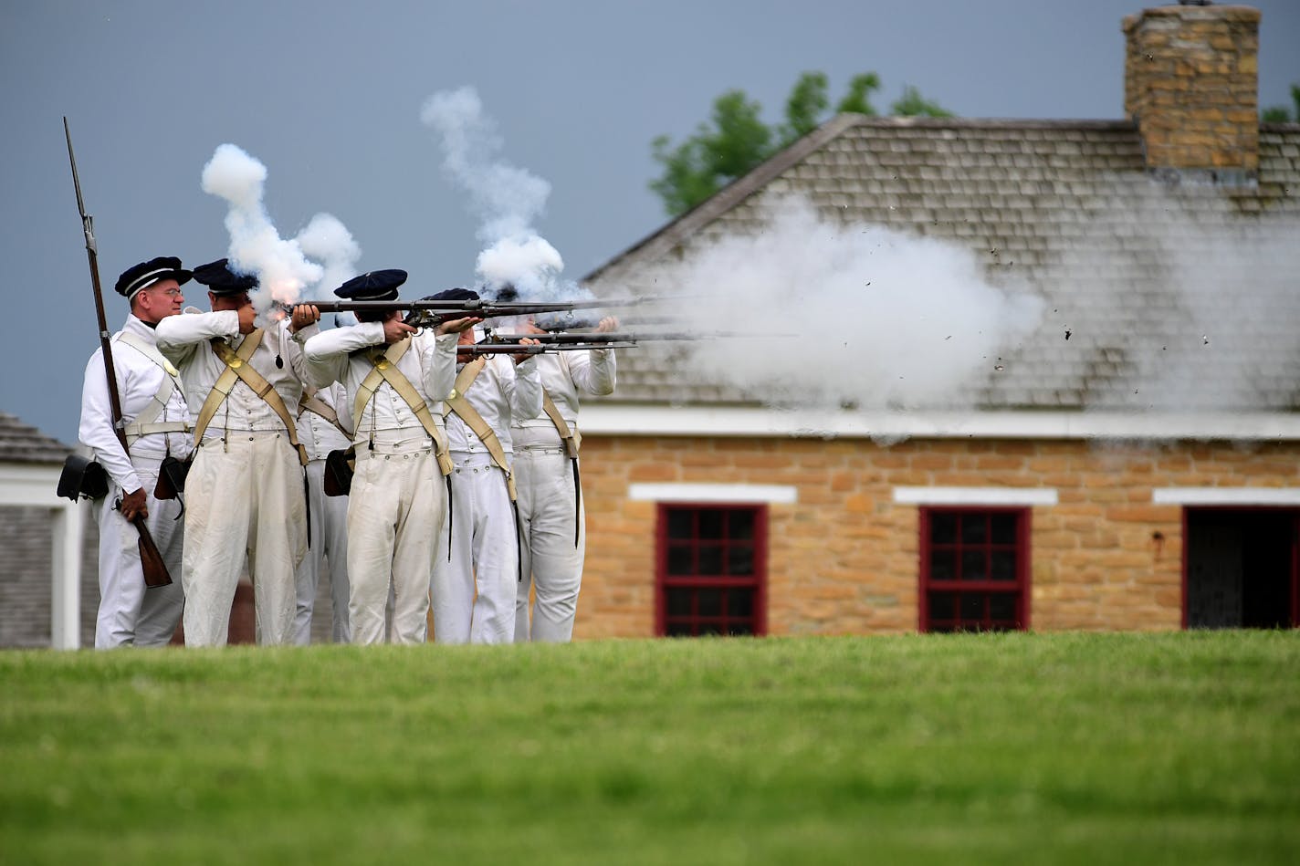 19th century period actors player soldiers fired off their 1816 Harper's Ferry muskets during an infantry demonstration Saturday at Historic Fort Snelling. ] (AARON LAVINSKY/STAR TRIBUNE) aaron.lavinsky@startribune.com Historic Fort Snelling opened for the season on Saturday, May 28, 2016 in the Unorganized Territory of Fort Snelling, Minn.